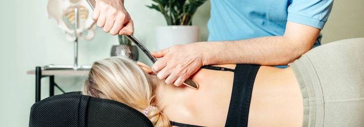 Chiropractic Bakersfield CA Graston Technique Chiropractic patient receiving the Graston Technique.