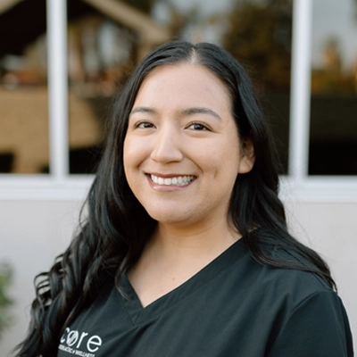 Chiropractor Mary Fernandez smiling.