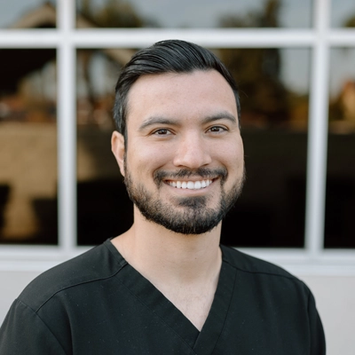 Chiropractor Zachary Acencio smiling.